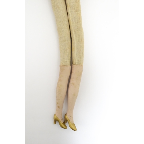 1277 - Toy: A 20thC French cloth boudoir doll body, with straw filled body and bisque hands and lower legs.... 