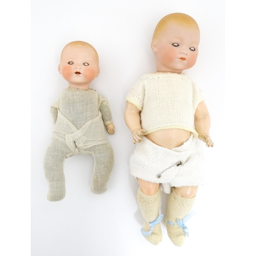 1285 - Toys: Two Armand Marseille German dolls, one with a bisque head marked 341 / 5k and a composite body... 