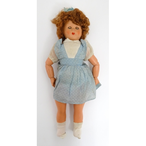 1286 - Toys: Five assorted dolls to include a French composite doll with blinking eyes, painted features an... 