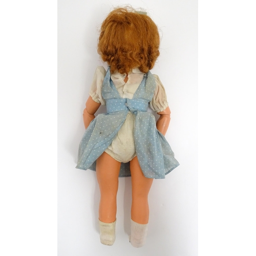 1286 - Toys: Five assorted dolls to include a French composite doll with blinking eyes, painted features an... 