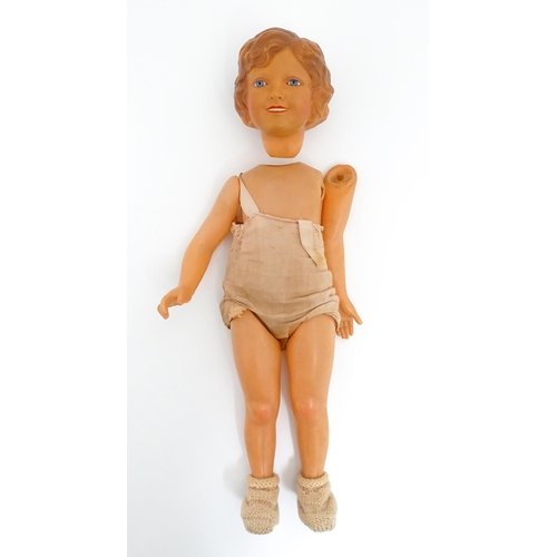 1286 - Toys: Five assorted dolls to include a French composite doll with blinking eyes, painted features an... 