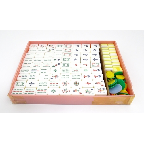 1290 - Toy: 20thC mahjong tiles and counters. The box marked Product of Mock Kee Plastic Industries, No. 17... 