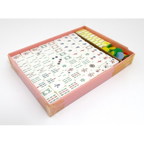 1290 - Toy: 20thC mahjong tiles and counters. The box marked Product of Mock Kee Plastic Industries, No. 17... 