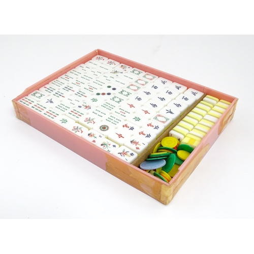 1290 - Toy: 20thC mahjong tiles and counters. The box marked Product of Mock Kee Plastic Industries, No. 17... 