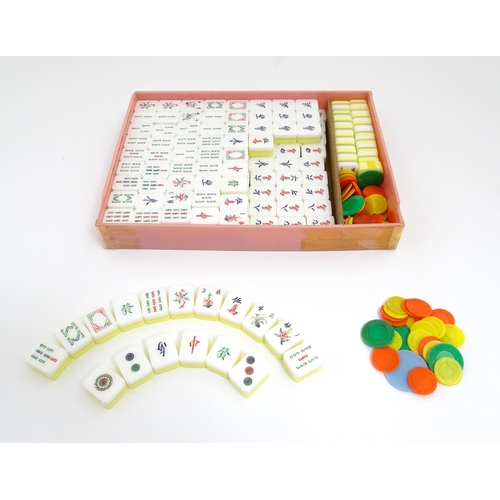 1290 - Toy: 20thC mahjong tiles and counters. The box marked Product of Mock Kee Plastic Industries, No. 17... 