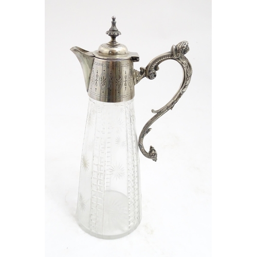 213 - A Mappin & Webb Princes plate claret jug, the cut glass body with silver plated mounts. Approx 12