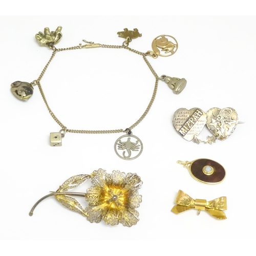 760 - Assorted jewellery to include silver brooch, silver gilt brooch, 9ct gold bow hanger, a pendant and ... 