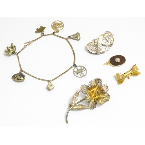 760 - Assorted jewellery to include silver brooch, silver gilt brooch, 9ct gold bow hanger, a pendant and ... 