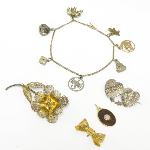 760 - Assorted jewellery to include silver brooch, silver gilt brooch, 9ct gold bow hanger, a pendant and ... 