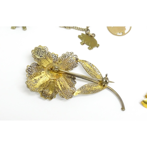 760 - Assorted jewellery to include silver brooch, silver gilt brooch, 9ct gold bow hanger, a pendant and ... 