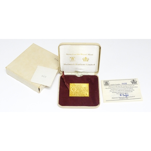 834 - Universal Postal Union 1874-1974: A 22ct gold Postal Union commemorative stamp replica. Replica numb... 