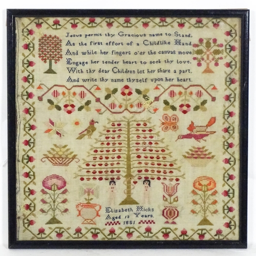 1250 - A 19thC needlework sampler embroidered with Adam and Eve, serpent and tree of life, flowers, foliage... 