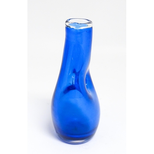 187 - A blue art glass vase by David Wall ( Tamar glass) signed under. Together with a white glass approx.... 