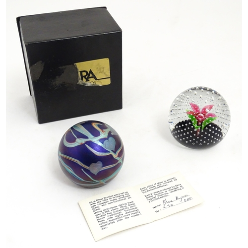 195 - Two glass paperweights, one by Okra  signed under  1984 BAP no. 250, the other CMG (Cecil Makenzie )