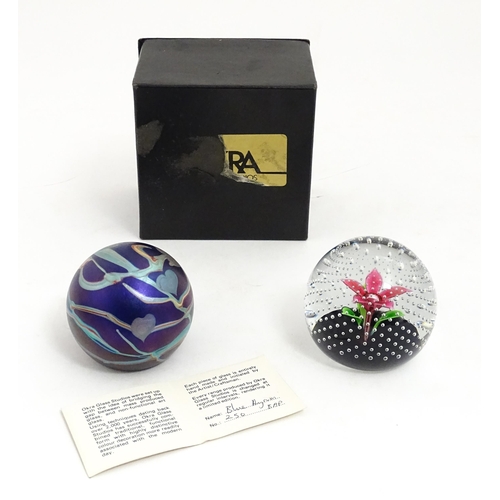 195 - Two glass paperweights, one by Okra  signed under  1984 BAP no. 250, the other CMG (Cecil Makenzie )