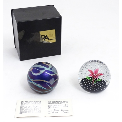 195 - Two glass paperweights, one by Okra  signed under  1984 BAP no. 250, the other CMG (Cecil Makenzie )