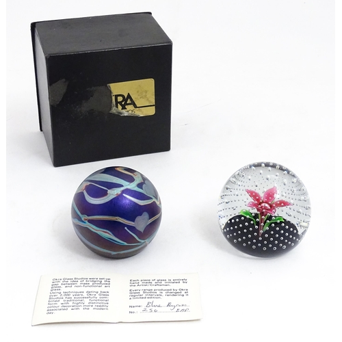 195 - Two glass paperweights, one by Okra  signed under  1984 BAP no. 250, the other CMG (Cecil Makenzie )