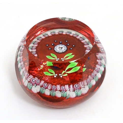 235 - A Perthshire Paperweights limited edition 1995 Christmas Robin paperweight  with mistletoe, star and... 