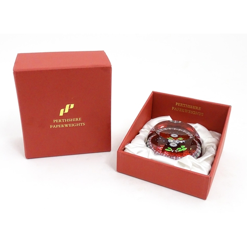 235 - A Perthshire Paperweights limited edition 1995 Christmas Robin paperweight  with mistletoe, star and... 