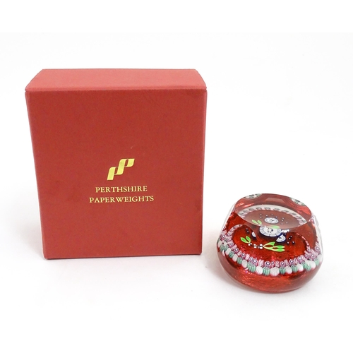 235 - A Perthshire Paperweights limited edition 1995 Christmas Robin paperweight  with mistletoe, star and... 