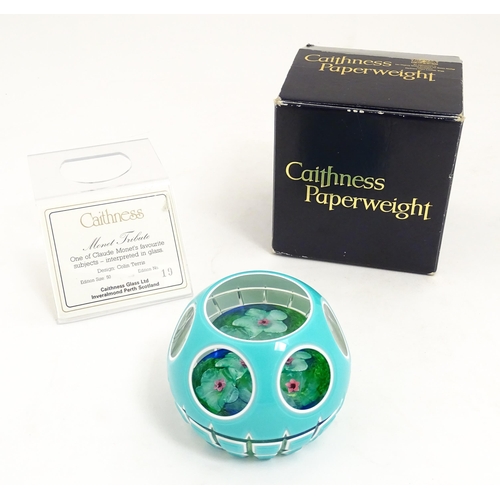 236 - Colin Terris for Caithness : A limited edition Caithness glass paperweight depicting waterlilies, si... 