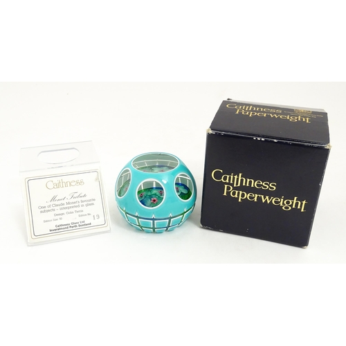 236 - Colin Terris for Caithness : A limited edition Caithness glass paperweight depicting waterlilies, si... 