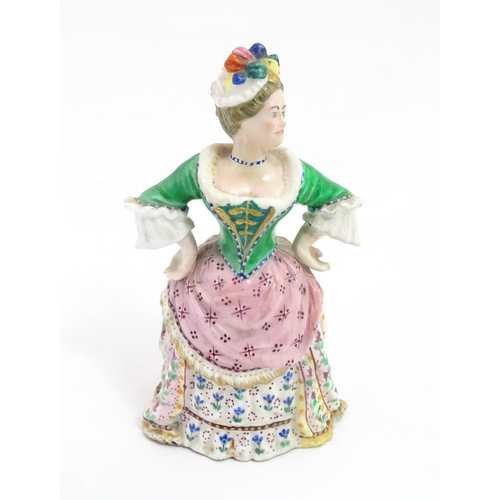 53A - A Minton candle snuffer modelled as Mrs. Malaprop from Richard Brinsley Sheridan's play The Rivals. ... 