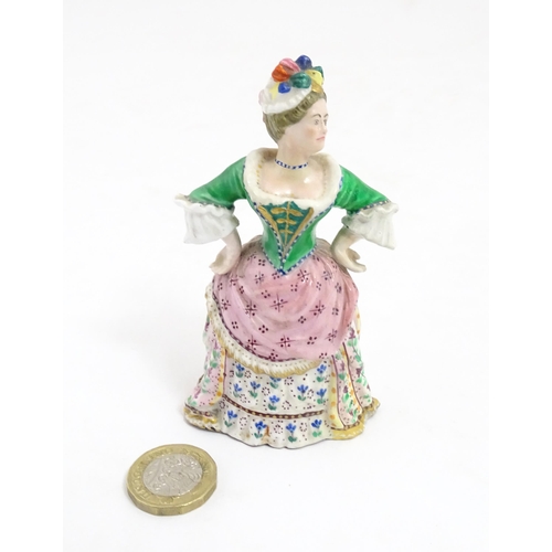 53A - A Minton candle snuffer modelled as Mrs. Malaprop from Richard Brinsley Sheridan's play The Rivals. ... 