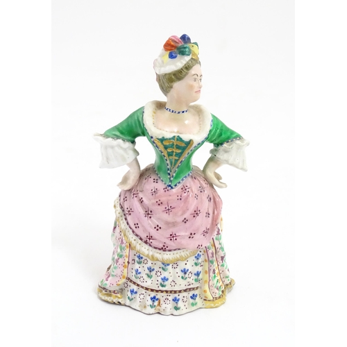 53A - A Minton candle snuffer modelled as Mrs. Malaprop from Richard Brinsley Sheridan's play The Rivals. ... 