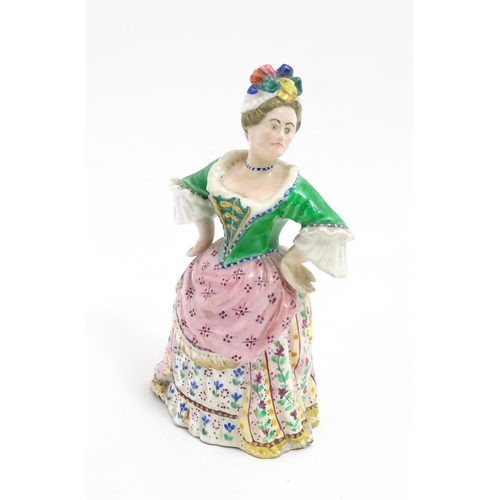 53A - A Minton candle snuffer modelled as Mrs. Malaprop from Richard Brinsley Sheridan's play The Rivals. ... 