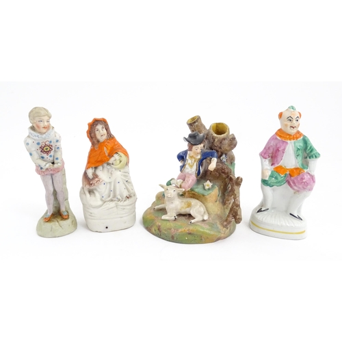 54 - Four assorted ceramic figures to include a Staffordshire pottery Red Riding Hood, a small clown figu... 