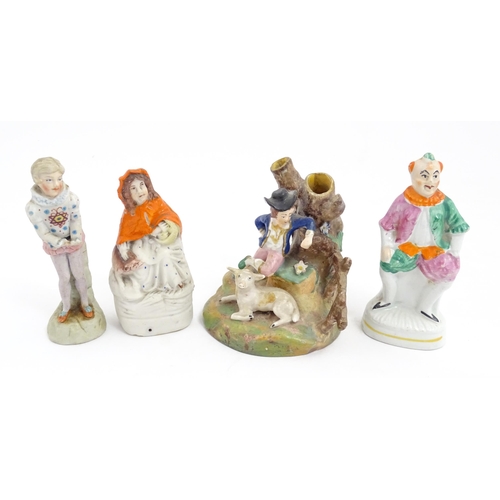 54 - Four assorted ceramic figures to include a Staffordshire pottery Red Riding Hood, a small clown figu... 