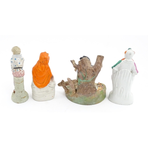 54 - Four assorted ceramic figures to include a Staffordshire pottery Red Riding Hood, a small clown figu... 