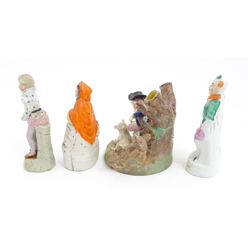 54 - Four assorted ceramic figures to include a Staffordshire pottery Red Riding Hood, a small clown figu... 