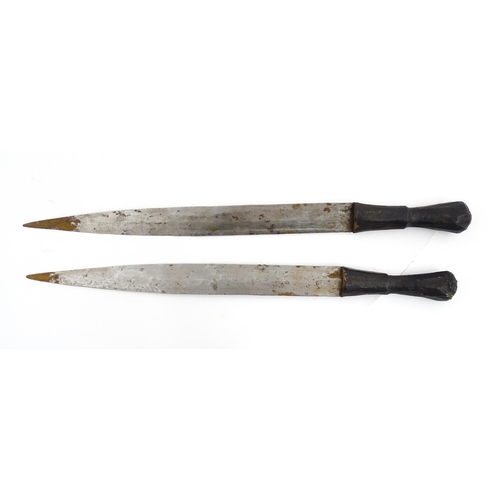 1239 - Four assorted blades, comprising an early 20thC Liuyedao / Yanglindao style sword, a pair of Shona k... 