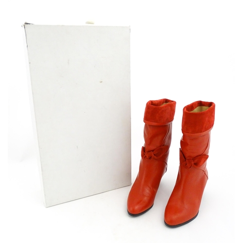 1261 - Vintage fashion / clothing: A pair of early 1990's Rombah Wallace red leather and suede boots. UK si... 