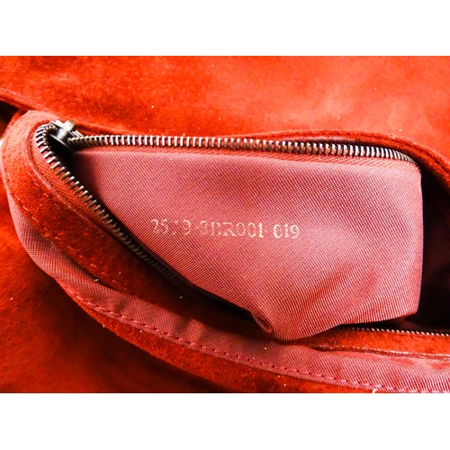 1263 - Vintage fashion / clothing: A Fendi Mamma Baguette handbag in red suede, numbered 2579-8BR001.019. A... 