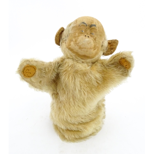 1269 - Toy: A Merrythought mohair hand puppet modelled as a monkey. Approx. 9 1/4