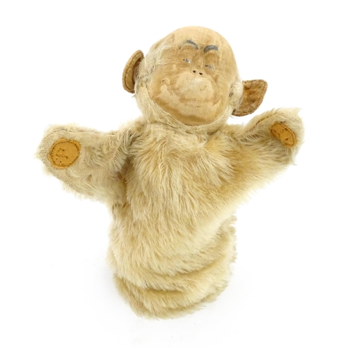 1269 - Toy: A Merrythought mohair hand puppet modelled as a monkey. Approx. 9 1/4