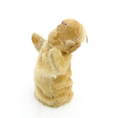 1269 - Toy: A Merrythought mohair hand puppet modelled as a monkey. Approx. 9 1/4