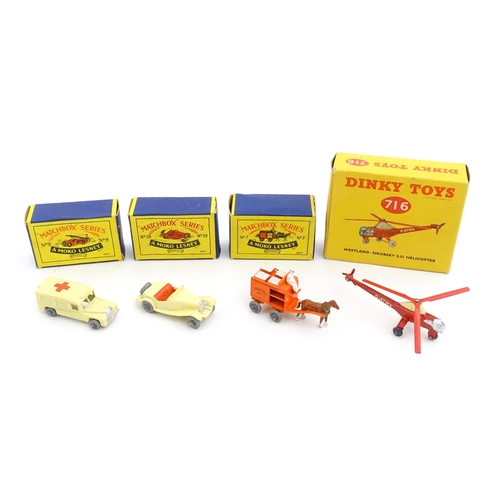 1272 - Toys: A boxed Dinky Toys die cast scale model of a helicopter no. 716. Together with three Moko Lesn... 