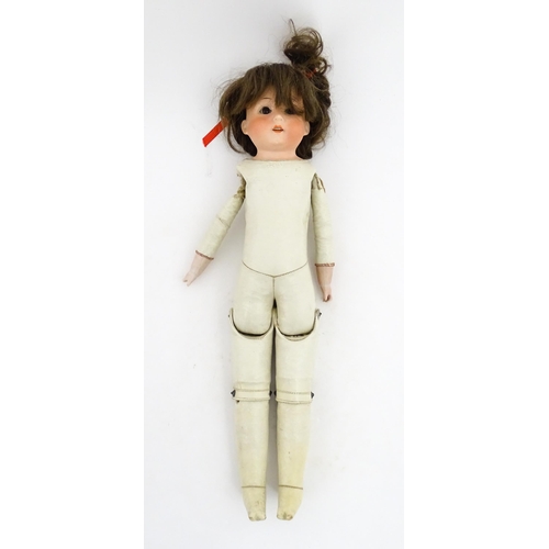 1282 - Toy: A 20thC Heubach Koppelsdorf German doll with bisque head and articulated leather body. Approx. ... 