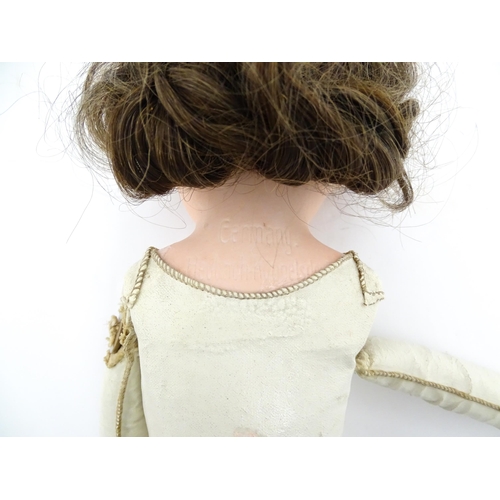 1282 - Toy: A 20thC Heubach Koppelsdorf German doll with bisque head and articulated leather body. Approx. ... 