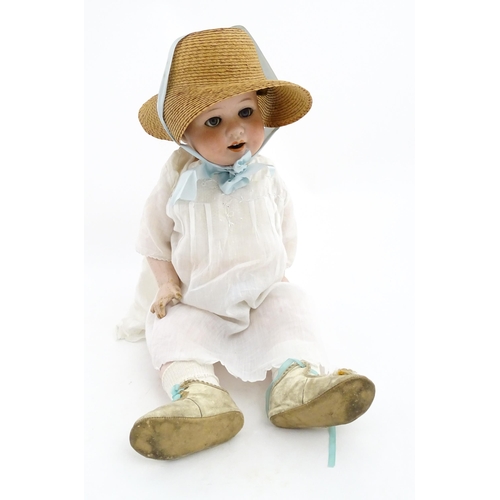 1283 - Toy: A 20thC Heubach Koppelsdorf German doll with bisque head, blinking eyes, and painted features, ... 