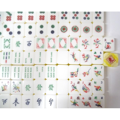 1290 - Toy: 20thC mahjong tiles and counters. The box marked Product of Mock Kee Plastic Industries, No. 17... 