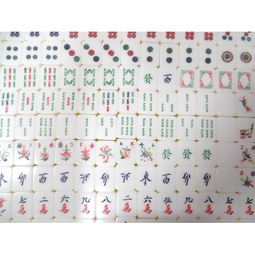 1290 - Toy: 20thC mahjong tiles and counters. The box marked Product of Mock Kee Plastic Industries, No. 17... 