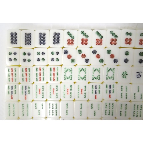 1290 - Toy: 20thC mahjong tiles and counters. The box marked Product of Mock Kee Plastic Industries, No. 17... 