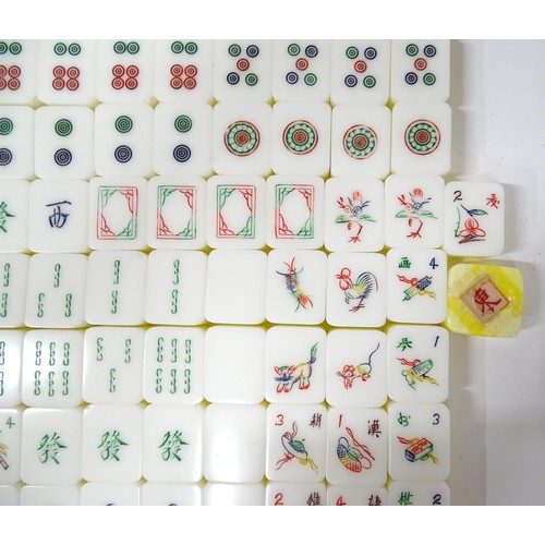 1290 - Toy: 20thC mahjong tiles and counters. The box marked Product of Mock Kee Plastic Industries, No. 17... 