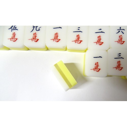 1290 - Toy: 20thC mahjong tiles and counters. The box marked Product of Mock Kee Plastic Industries, No. 17... 