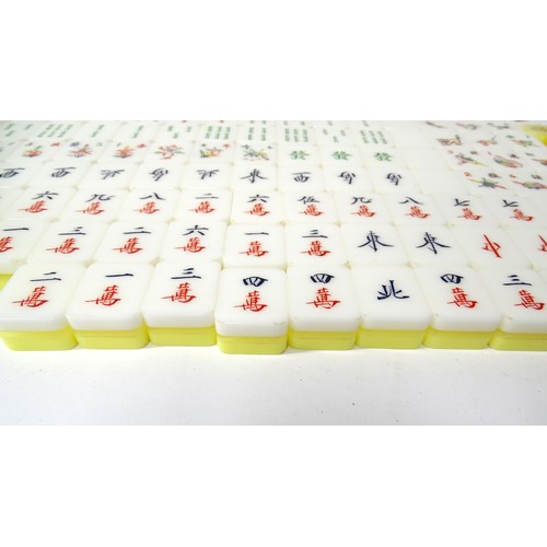 1290 - Toy: 20thC mahjong tiles and counters. The box marked Product of Mock Kee Plastic Industries, No. 17... 